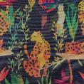 Coupon of  Deckchair fabric with leopard and palm tree motifs on a navy background 3,20m x 0,43m