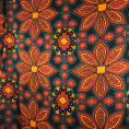 Polyester twill fabric coupon with floral pattern in orange tones on black background 1.50m or 3m x 1.40m
