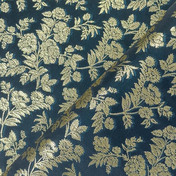 Coupon of black polyester jacquard fabric with turquoise reflection and gold flower pattern 1.50m or 3m x 1.40m
