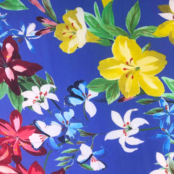 Polyester crepe fabric coupon with multicoloured floral pattern on a blueberry background 3m x 1.40m