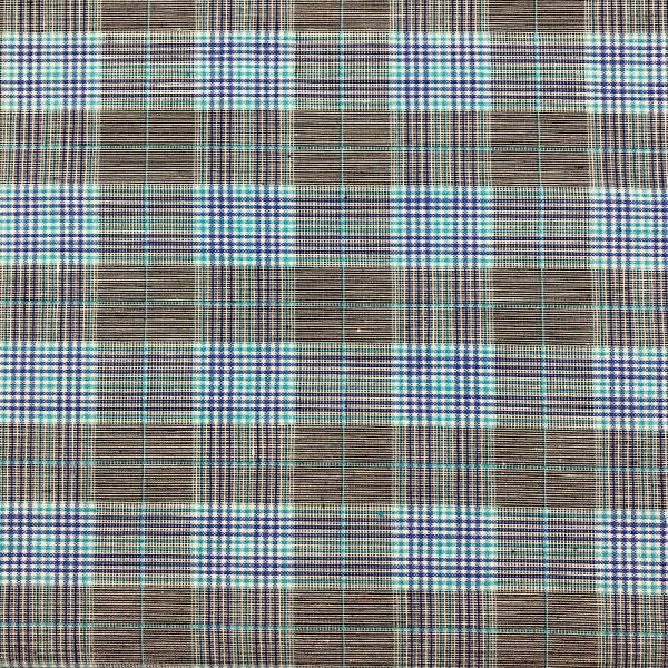Coupons of Prince of Wales style checkered linen fabric in blue and turquoise on a black and cream heathered background 3m x 1.40m