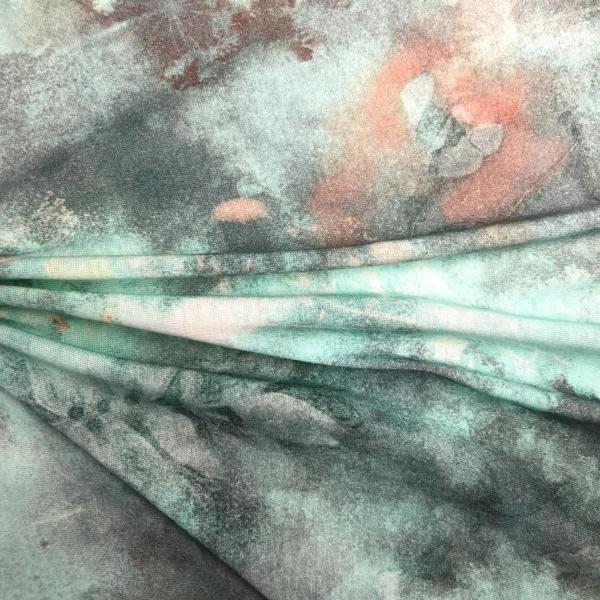 Tie and dye cotton jersey fabric with faded flowers in green tones 1,50m or 3m x 1,40m