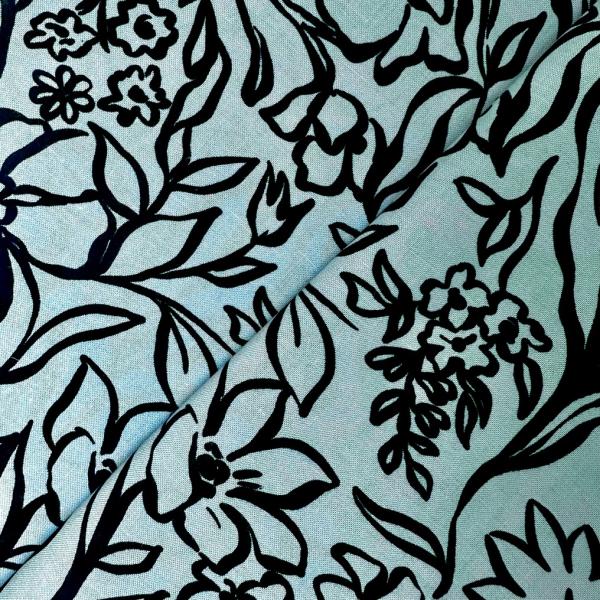 Viscose and linen fabric coupon with black floral prints on blue background 3m 1m50 x 1,40m