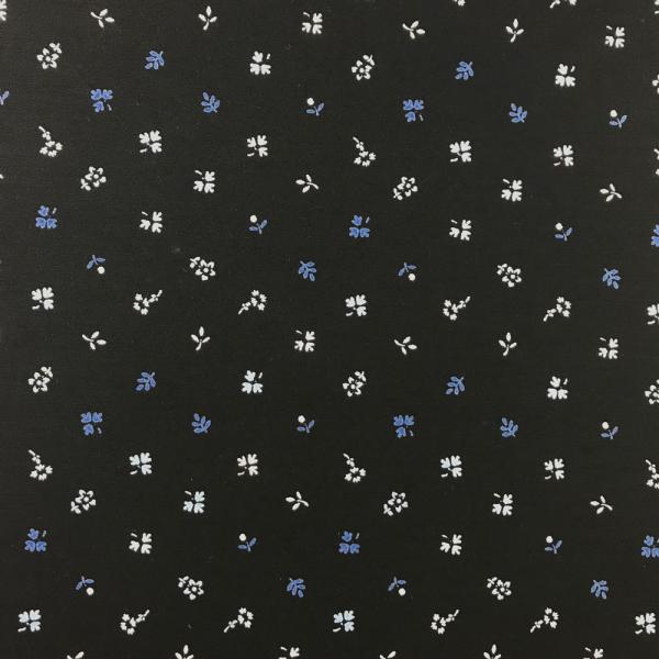 Coupon of viscose fabric with blue and white flowery print on black background 1,50m or 3m x 1,40m