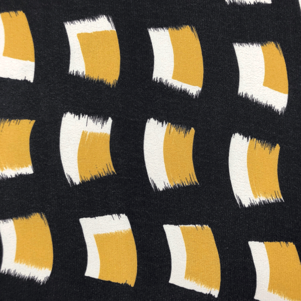 Coupon de tissu crêpe de viscose aux motif gaphiques jaune et blanc sur fond noir 1,50m ou 3m x 1,40m