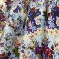 Coupon de tissu en twill de soie et viscose avec un motif floral multicolore sur fond bleu ciel 1,50m ou 3m x 1,40m