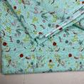Coupon de tissu toile de lin motifs feuilles et fleurs rosé sur fond vert 3m x 1,40m