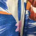 Coupon de tissu en toile  lin à imprimés floraux colorés sur fond orange 3m x 1,40m