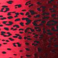 Coupon de tissu en dévoré de soie et viscose motif peau de panthère sur une base en satin rouge 3m x 1,40m