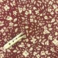 Coupon de tissu stretch en polyester et élasthanne à imprimés fleuris beiges sur fond rouille 1,50m ou 3m x 1,40m