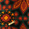 Coupon de tissu en twill de polyester à motif floral dans des tonalités orangés sur fond noir 1,50m ou 3m x 1,40m