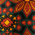 Coupon de tissu en twill de polyester à motif floral dans des tonalités orangés sur fond noir 1,50m ou 3m x 1,40m