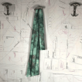 Coupon de tissu en jersey de coton tie and dye à motifs fleurs effacées dans les tons de vert 1,50m ou 3m x 1,40m