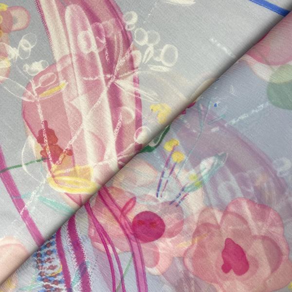Coupon de tissu en mousseline crinkle aux motifs fleuris sur fond bleu ciel 1,50m ou 3m x 1,40m
