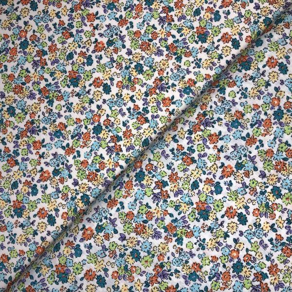 Coupon de tissu en popeline de coton imprimée avec motif de fleurs multicolores sur fond blanc 1m50 ou 3m x 1m40